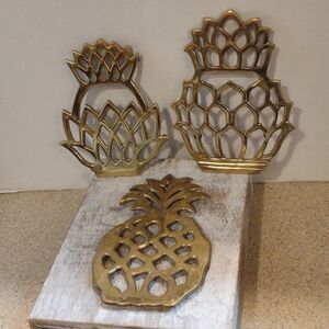 👍 Set of Three Brass Pineapple trivets.  C7